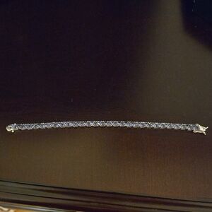 Elegant Sterling Silver and Tanzanite Tennis Bracelet